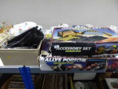 Two boxed Scalectrix sets and a box of track and power pack