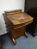 An inlaid mahogany Edwardian Davenport