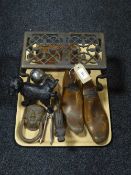A pair of wooden shoe stretchers, metal trivet, cast metal Scottie dog door stop,