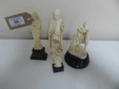 Four carved figures : geisha,