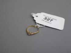 An 18ct gold diamond solitaire ring, 0.