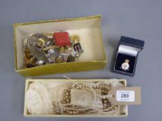 A box of costume jewellery, cufflinks, lapel badges etc.