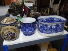 A blue and white ironstone foot bath,