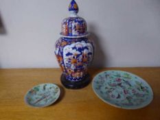 An Imari lidded vase on wooden stand, vase 37cm,