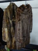 Two 3/4 length Coney fur coats