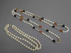 A large single and double strap of fresh water pearls