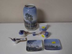 Three Bing and Grondahl bird ornaments together with two Royal Copenhagen dishes and two vases,