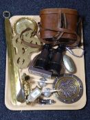 A tray containing assorted brassware, miniature woodworking plane,