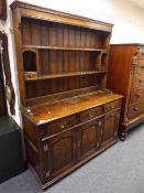 A Georgian style oak dresser