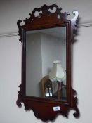 A mahogany Chippendale style wall mirror