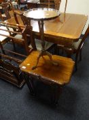 A nest of three mahogany tables and a mahogany wine table