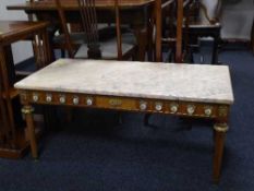 An inlaid mahogany marble topped coffee table with ormolu mounts