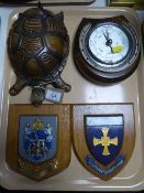 An oak horseshoe barometer with silvered dial,