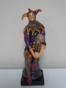 A Royal Doulton figure,