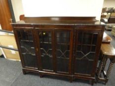 A mahogany break-front four door bookcase