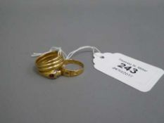 An 18ct gold snake ring set with rose cut diamond eyes,