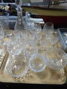 A tray of cut glass wine glasses, brandy glasses,