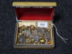 A box of assorted costume jewellery and a silver fob