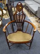 A Victorian inlaid mahogany corner chair
