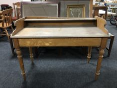 An antique pine washstand.