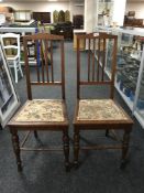 A set of three Edwardian mahogany rail backed bedroom chairs