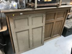 An early 20'th Century oak school cupboard.