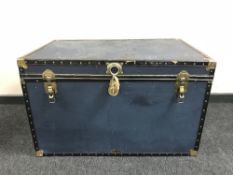 A large metal bound travelling trunk
