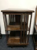 An oak revolving book stand