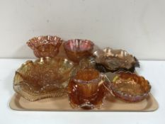 A tray containing ten pieces of carnival glass