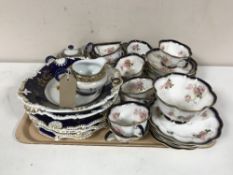 A tray of thirty one piece English china tea set, gilded sugar and milk,
