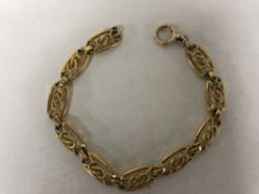 A yellow gold ornate bracelet, apparently unmarked, 13.8g, length 20 cm.