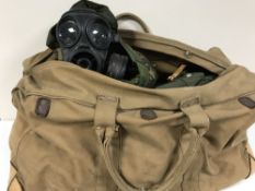 A large holdall containing army DP holdalls,