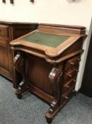 A reproduction mahogany davenport,