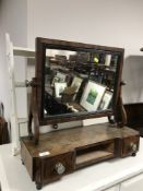 A Victorian mahogany toilet mirror and a painted wall rack