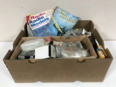 Two boxes of model aircraft accessories,