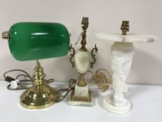 Two marble table lamps together with a brass banker's desk lamp