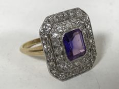 An Art Deco amethyst and diamond tiered panel ring, 19mm x 17mm, 5.9g, size M.
