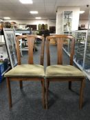 A set of six Meredew teak dining chairs together with gilt two tier trolley