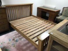 A contemporary oak 5' rail bed