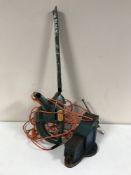 A Black & Decker hedge trimmer and a heavy duty bench vice