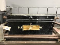 A metal deed box,with key, together with a book press.