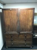 A Victorian mahogany linen press.