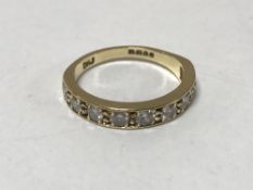 18ct half eternity ring with eight stones 5.