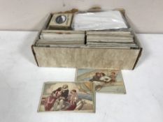 An album and box of antiquarian coloured and monochrome postcards