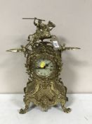 An ornate gilt metal French style mantel clock
