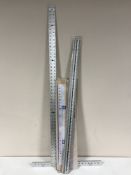 A collection of metal rules,