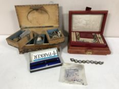 Two boxes of assorted costume jewellery, chains, lockets,