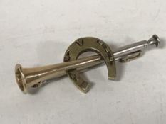 A two-tone gold hunting horn bar brooch mounted with a horseshoe