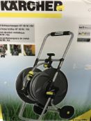 A boxed Karcher hose on reel