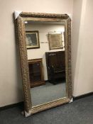 A Victorian style gilt framed overmantel mirror,